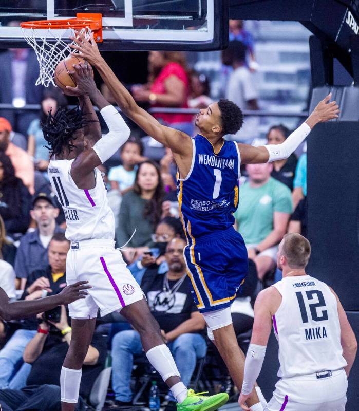 NBA G League Ignite forward Leonard Miller (11) has a shot attempt rejected by Metropolitans 92 ...