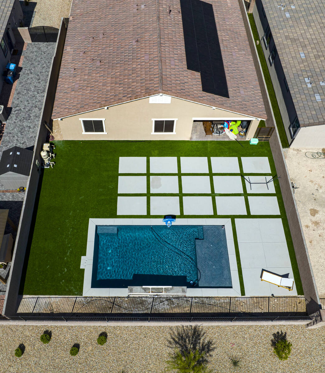 An aerial view of the backyard of the house where police officers shot a man is photographed, o ...