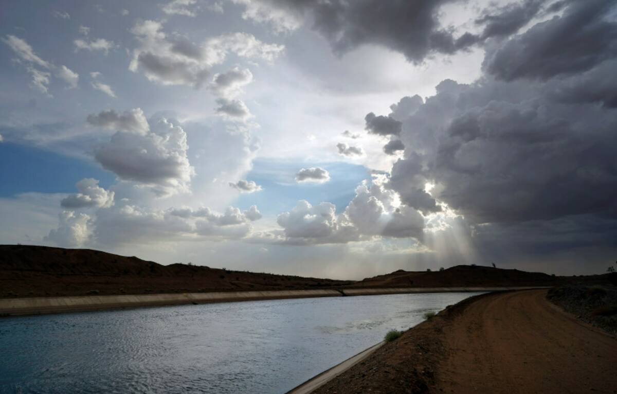 Water flows along the All-American Canal Saturday, Aug. 13, 2022, near Winterhaven, Calif. (AP ...