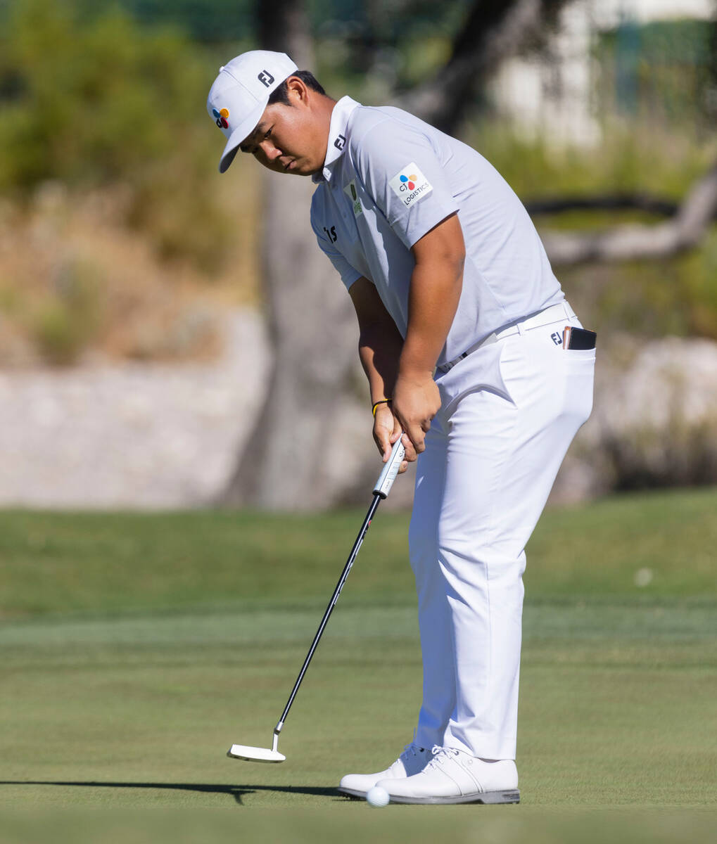 Tom Kim watches his putt at the second green during the first round of the Shriners Children's ...