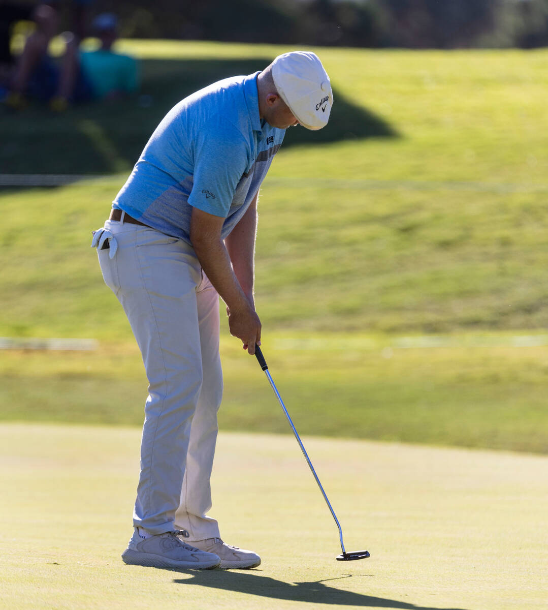 Harry Hall watches his putt at the ninth green during the first round of the Shriners Children' ...
