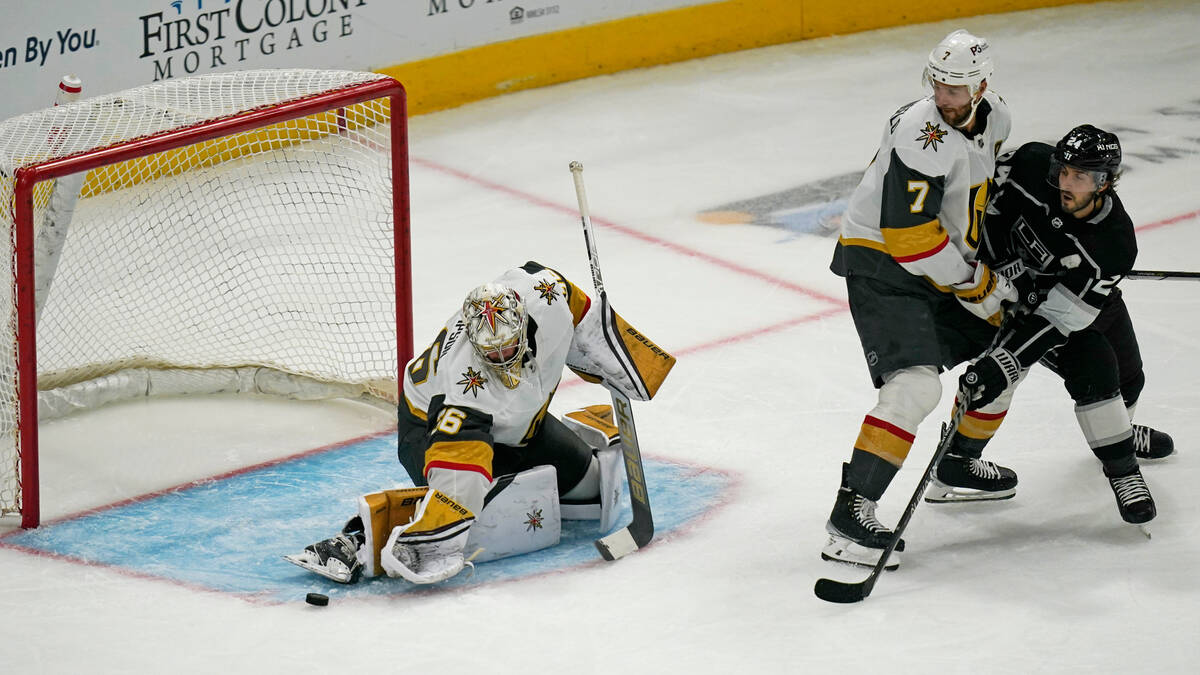 Vegas Golden Knights defenseman Alex Pietrangelo (7) defends against Los Angeles Kings center P ...