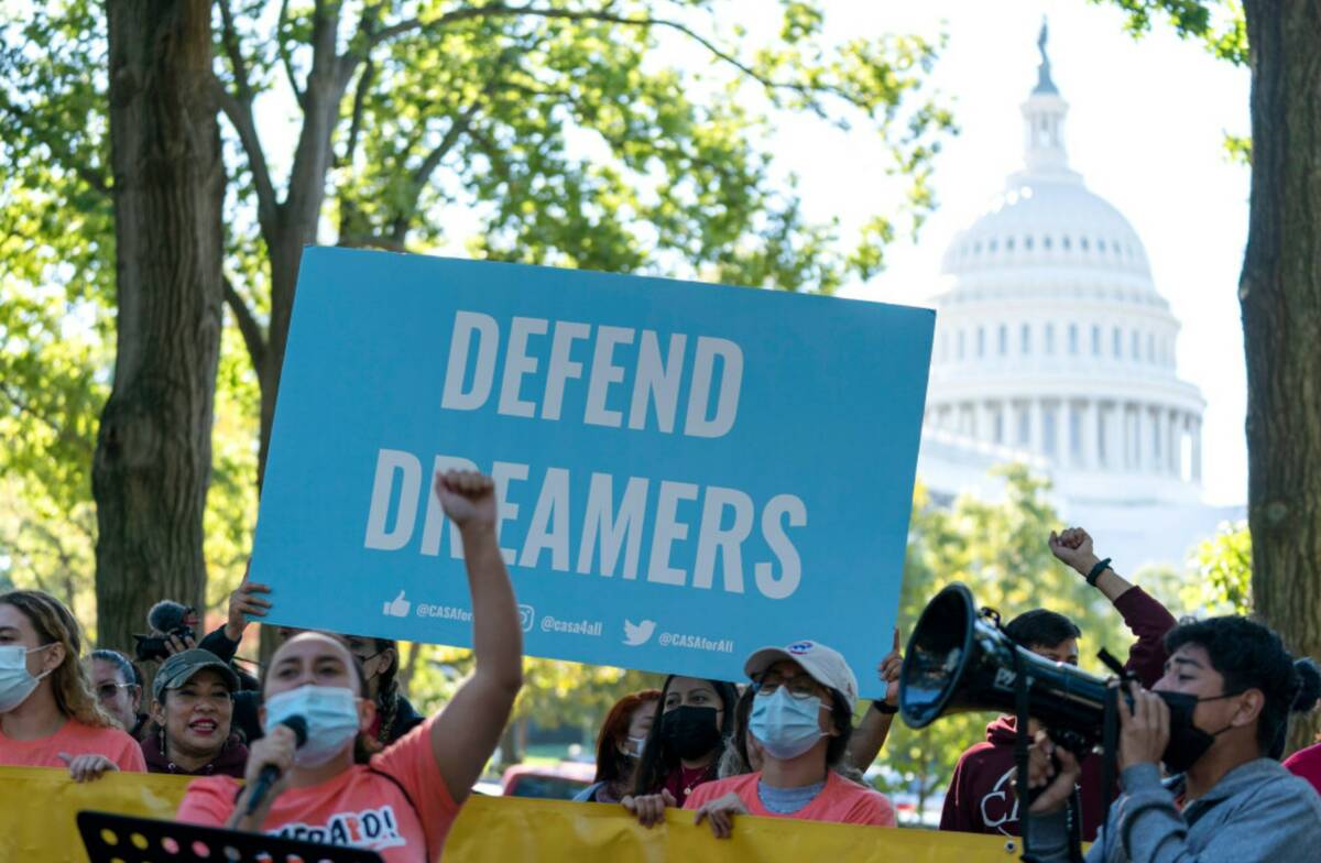 People rally outside the Capitol in support of the Deferred Action for Childhood Arrivals (DACA ...