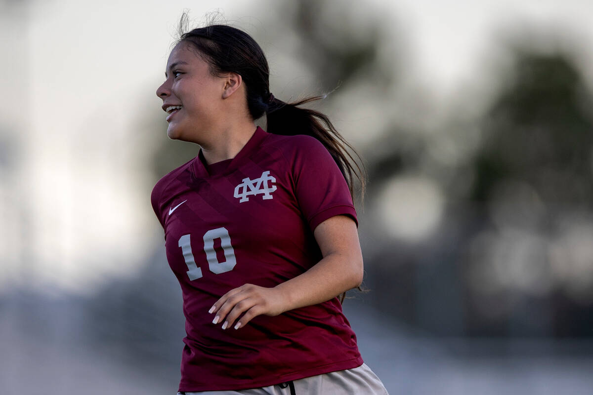 Cimarron-Memorial forward Melinda Bravo-Avendano (10) turns to celebrate with her team after wi ...