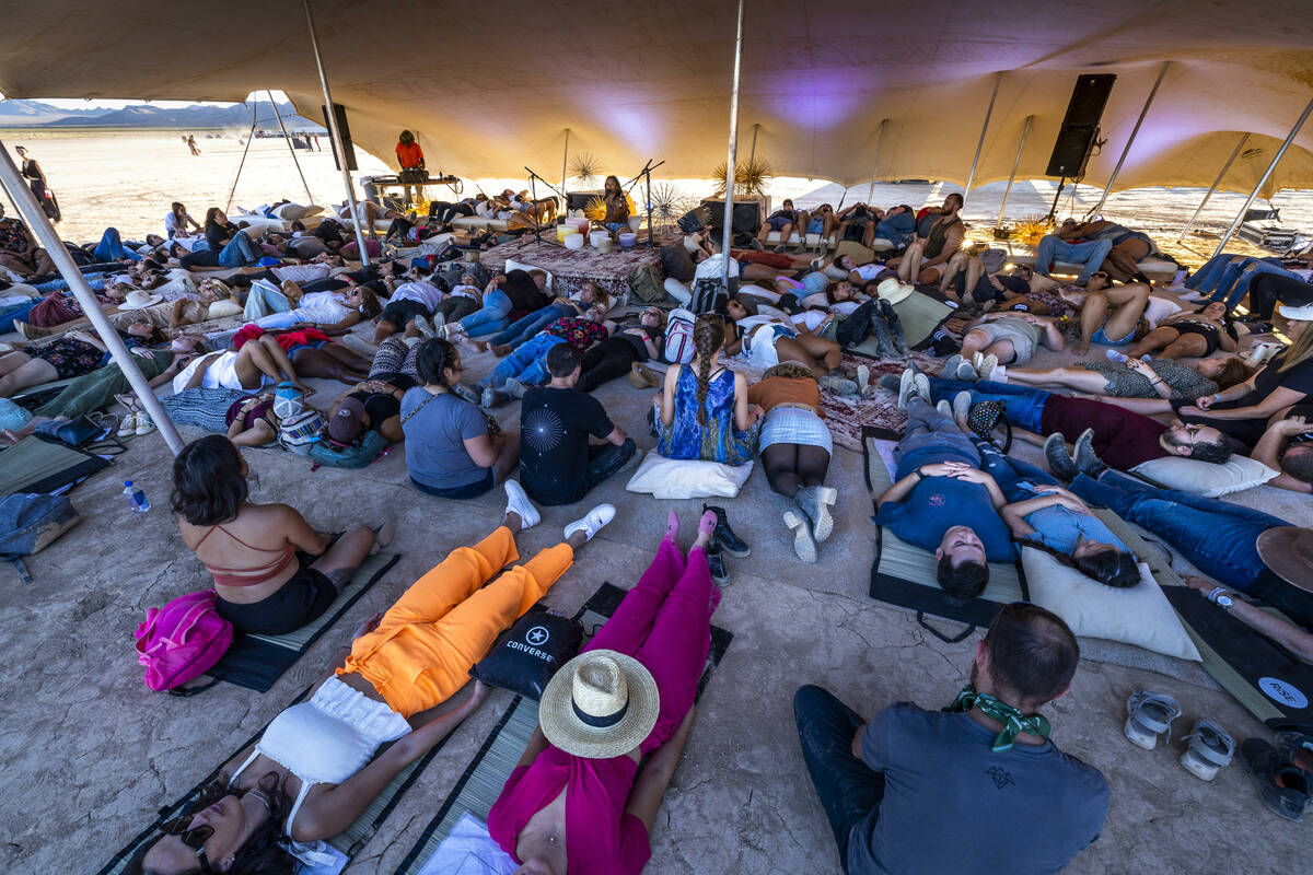 Participants take in a soundbath meditation during the RiSE Lantern Fest at the Jean Dry Lake B ...