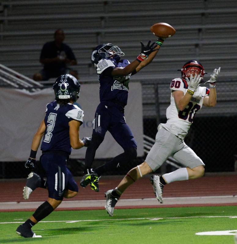 Coronado’s Luca Ciambra (80) fails to make the catch against Shadow Ridge’s ...