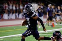 Shadow Ridge’s Coen Nicholas Coloma runs into the end zone for a touchdown during the se ...