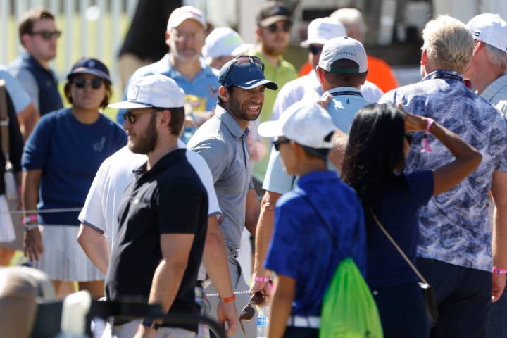 Aaron Rai, center, greets fans after the third round of the Shriners Children's Open tournament ...
