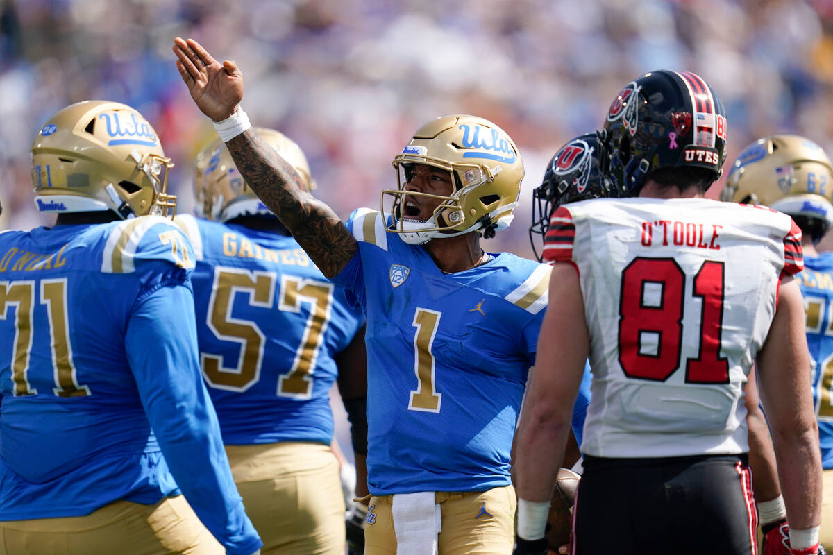 UCLA quarterback Dorian Thompson-Robinson (1) signals a first down during the first half of an ...