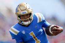 UCLA quarterback Dorian Thompson-Robinson (1) runs to the end zone for a touchdown during the f ...