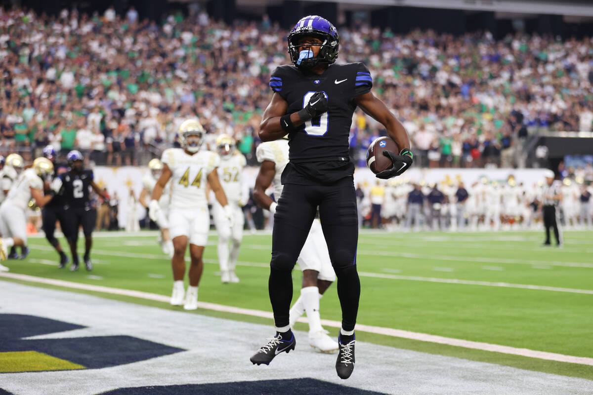 Brigham Young Cougars wide receiver Kody Epps (0) celebrates a touchdown catch during the first ...