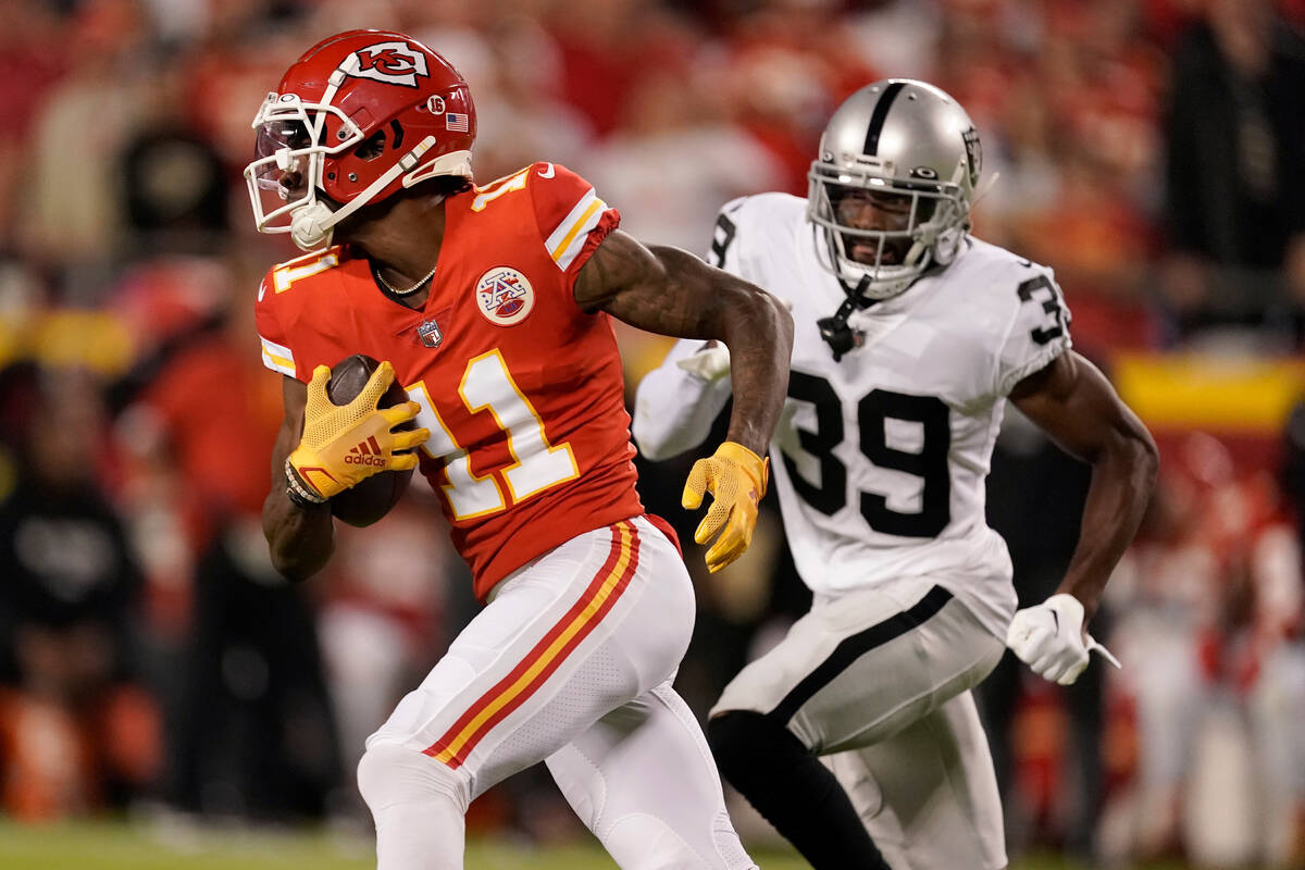 Kansas City Chiefs wide receiver Marquez Valdes-Scantling (11) runs with the ball past Las Vega ...