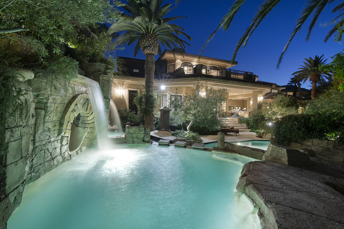 The pool area has water features. (Corcoran Global Living)