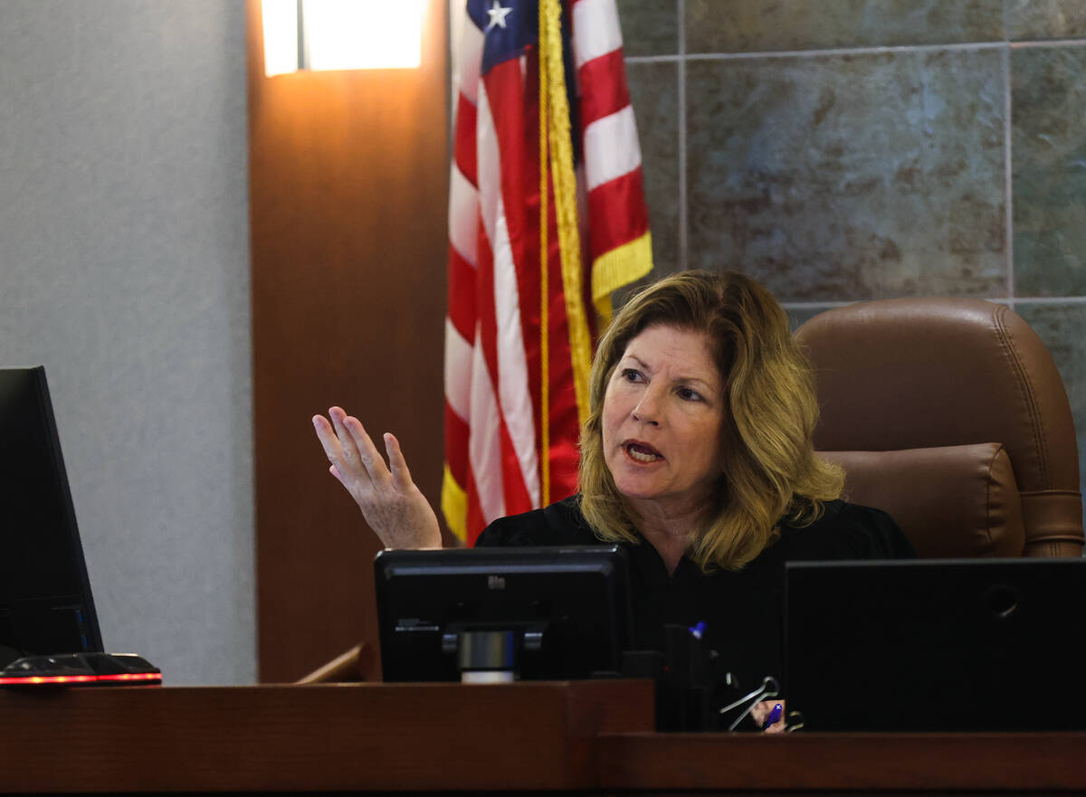 District Judge Susan Johnson addresses counsel during a hearing regarding the Review-Journal’ ...