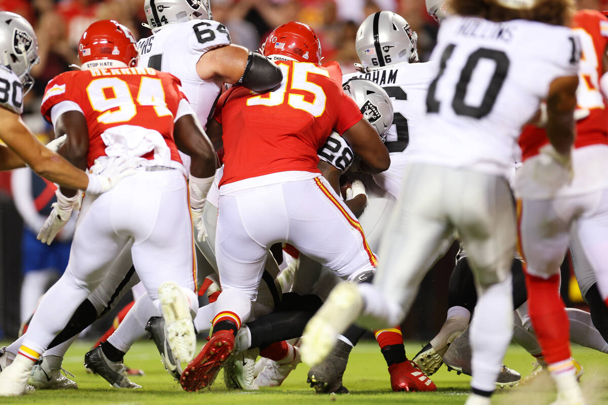 Raiders running back Josh Jacobs (28) is stopped short of the end zone during a two-point conve ...