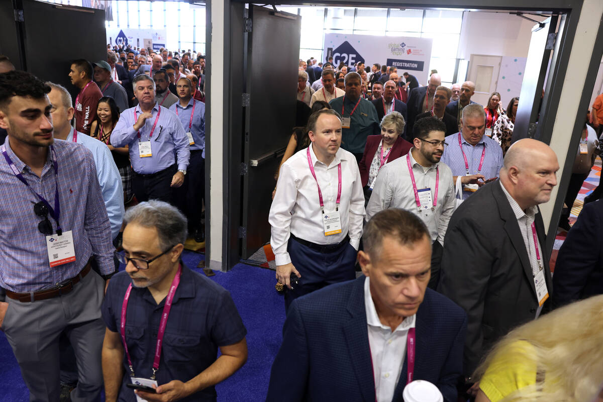 Conventioneers flow onto the show floor at the Global Gaming Expo (G2E) at The Venetian Expo in ...