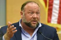 FILE - Infowars founder Alex Jones testifies at the Sandy Hook defamation damages trial at Con ...