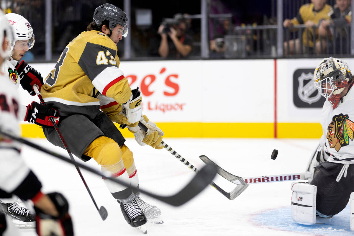 Golden Knights center Paul Cotter (43) attempts to score against Blackhawks goaltender Alex Sta ...