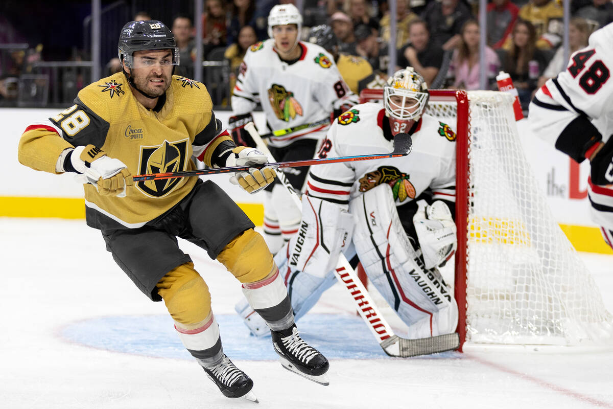 Golden Knights left wing William Carrier (28) skates for the puck after a failed shot on Blackh ...