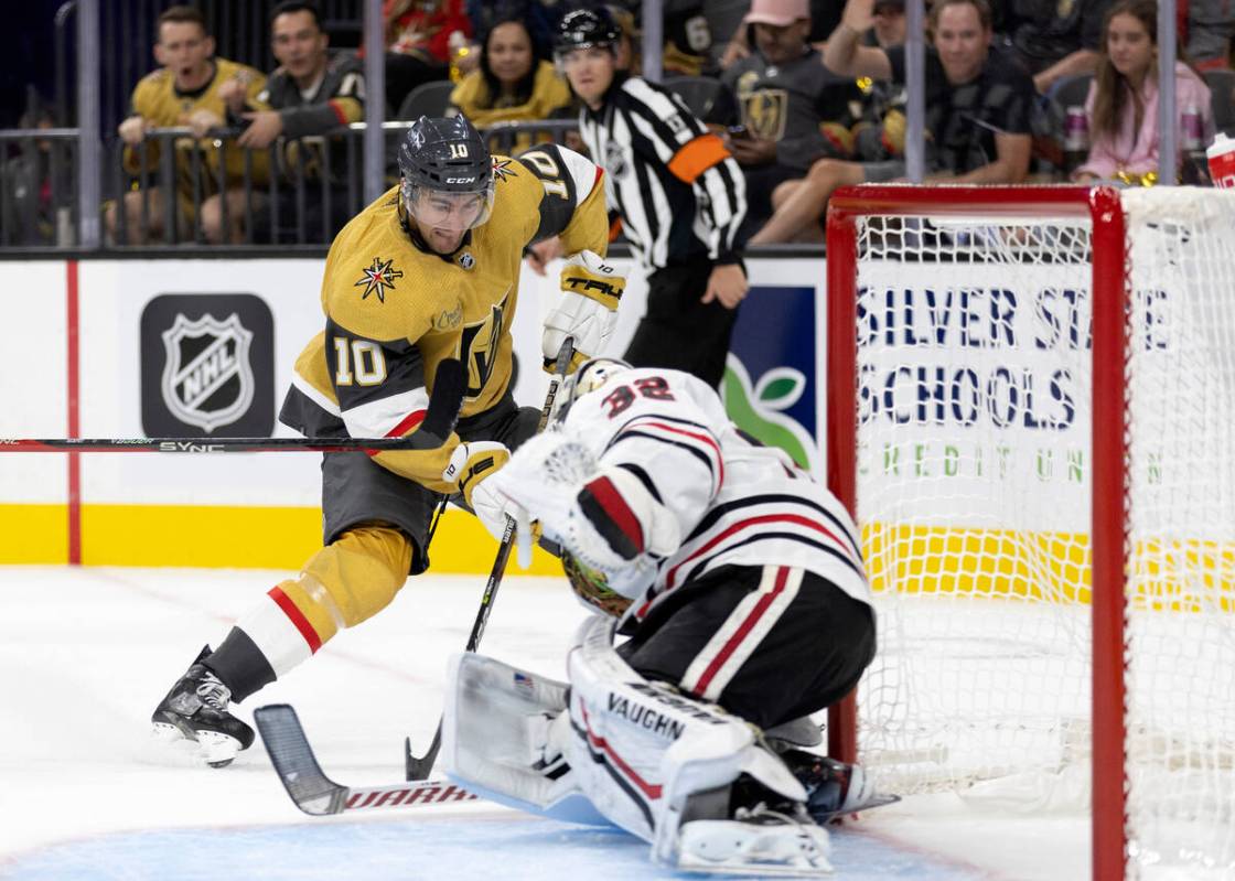 Golden Knights center Nicolas Roy (10) attempts to score against Blackhawks goaltender Alex Sta ...