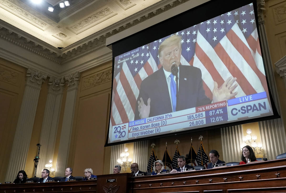 A video of then-President Donald Trump is shown on a screen as the House select committee inves ...