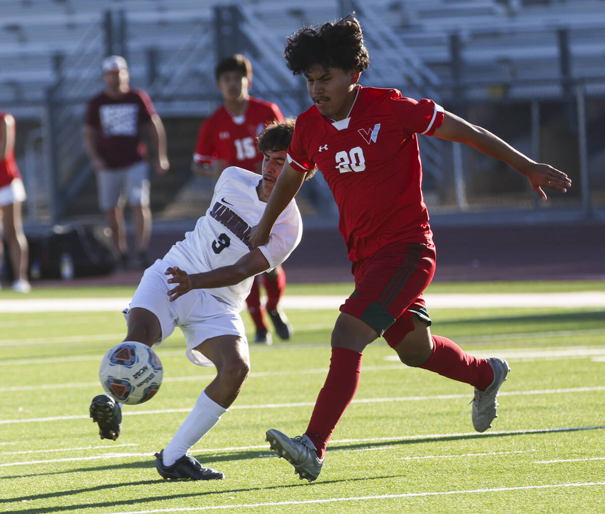 Desert Oasis' Lazzar Ramos (3) and Western's Alex Rodriguez (20) battle for the ball during a s ...