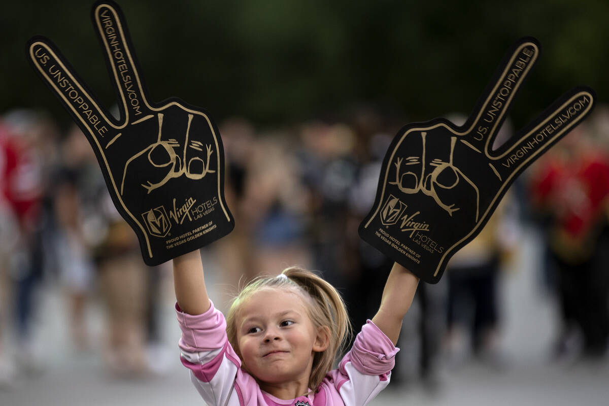 Madison Lee, 6, dances during the pregame show before an NHL hockey game between the Golden Kni ...