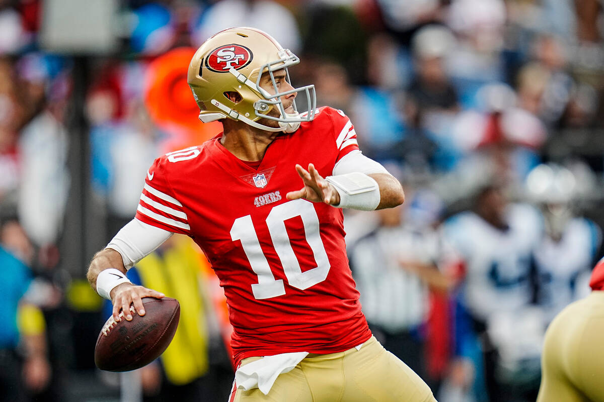 San Francisco 49ers quarterback Jimmy Garoppolo (10) prepares to pass during an NFL football ga ...