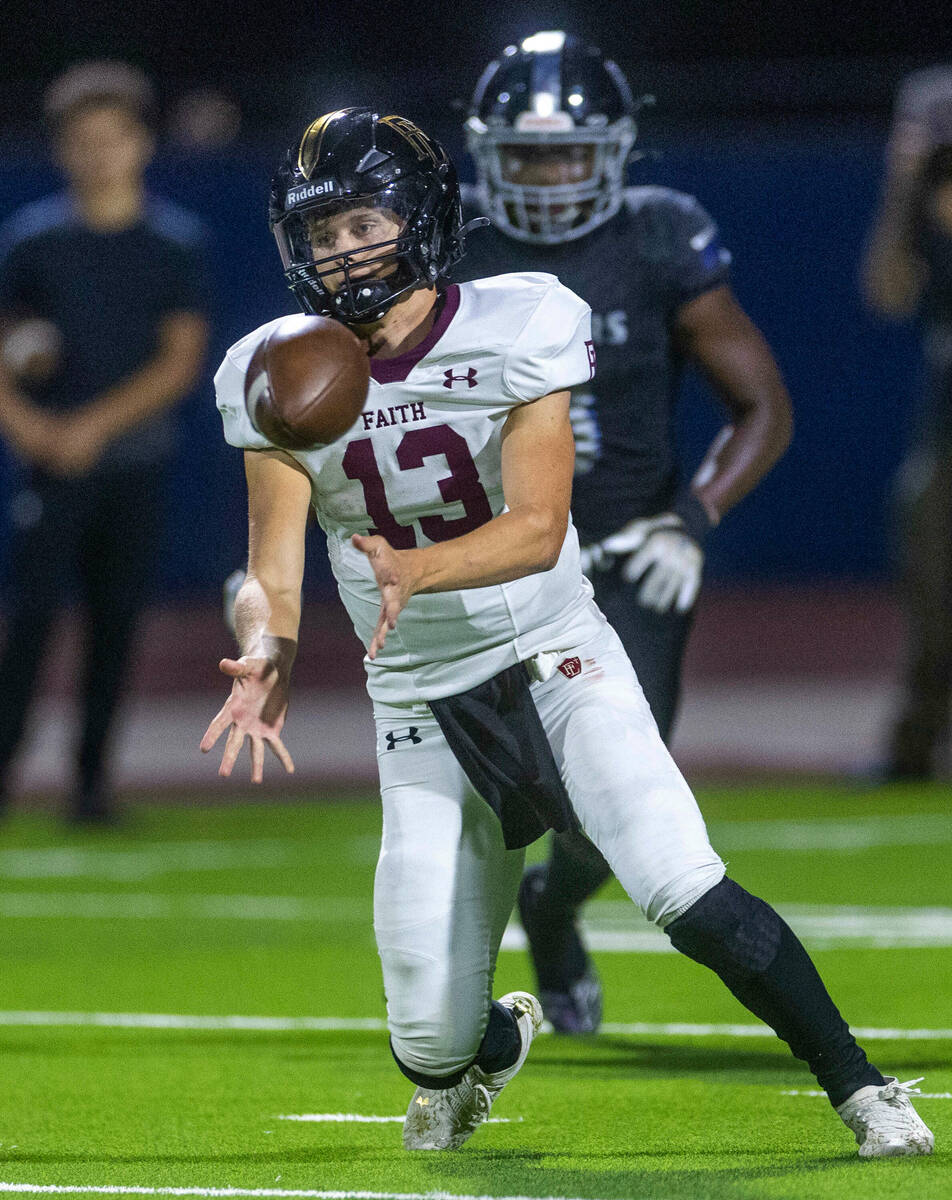 Faith Lutheran's QB Rylan Walter (13) gets off a toss versus Desert Pines during the second hal ...
