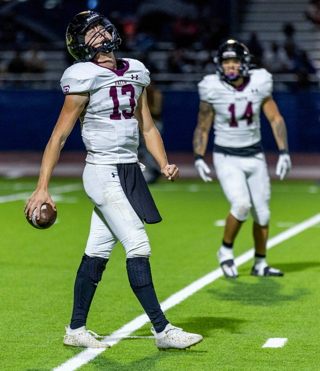 Faith Lutheran's QB Rylan Walter (13) is frustrated with another penalty versus Desert Pines du ...