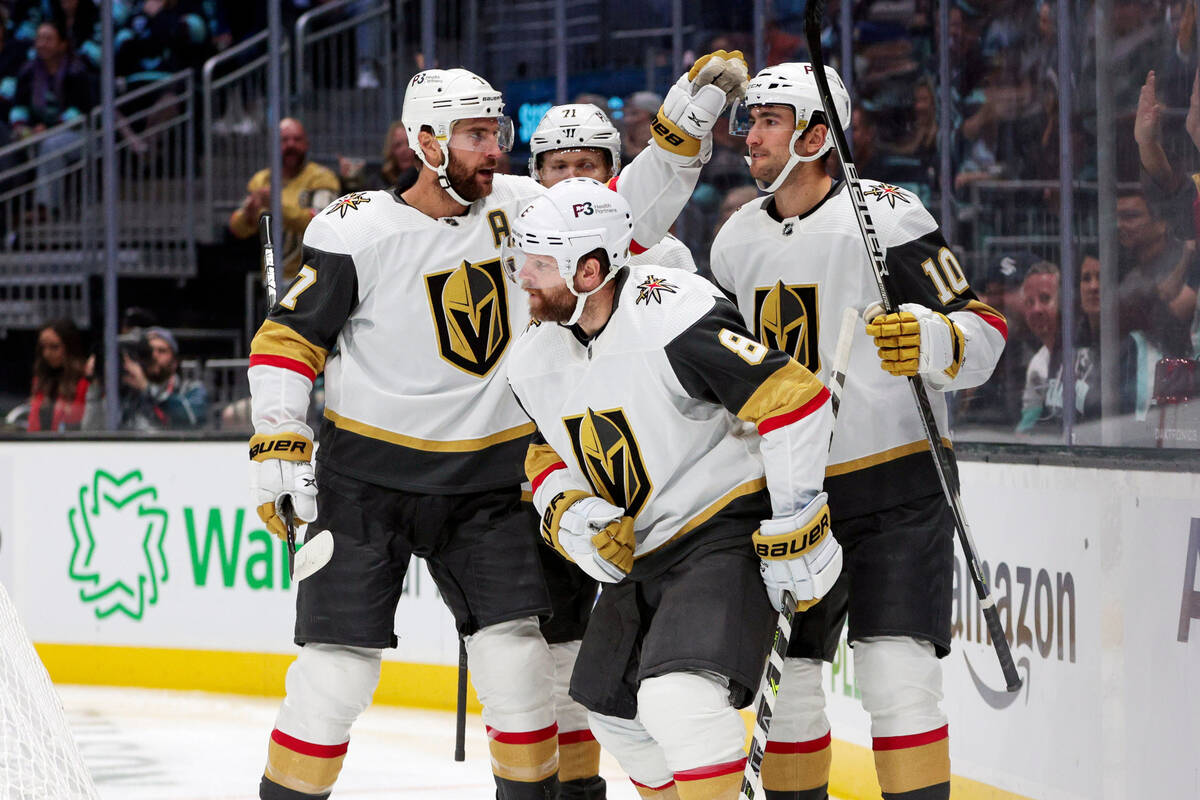 Vegas Golden Knights players, from left, Alex Pietrangelo, William Karlsson (71), Phil Kessel ( ...