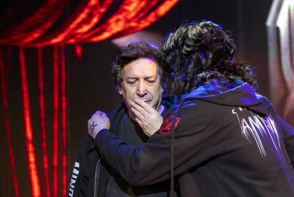 "Amystika" co-creators Franco Dragone, left, and Criss Angel share a private word as they talk ...