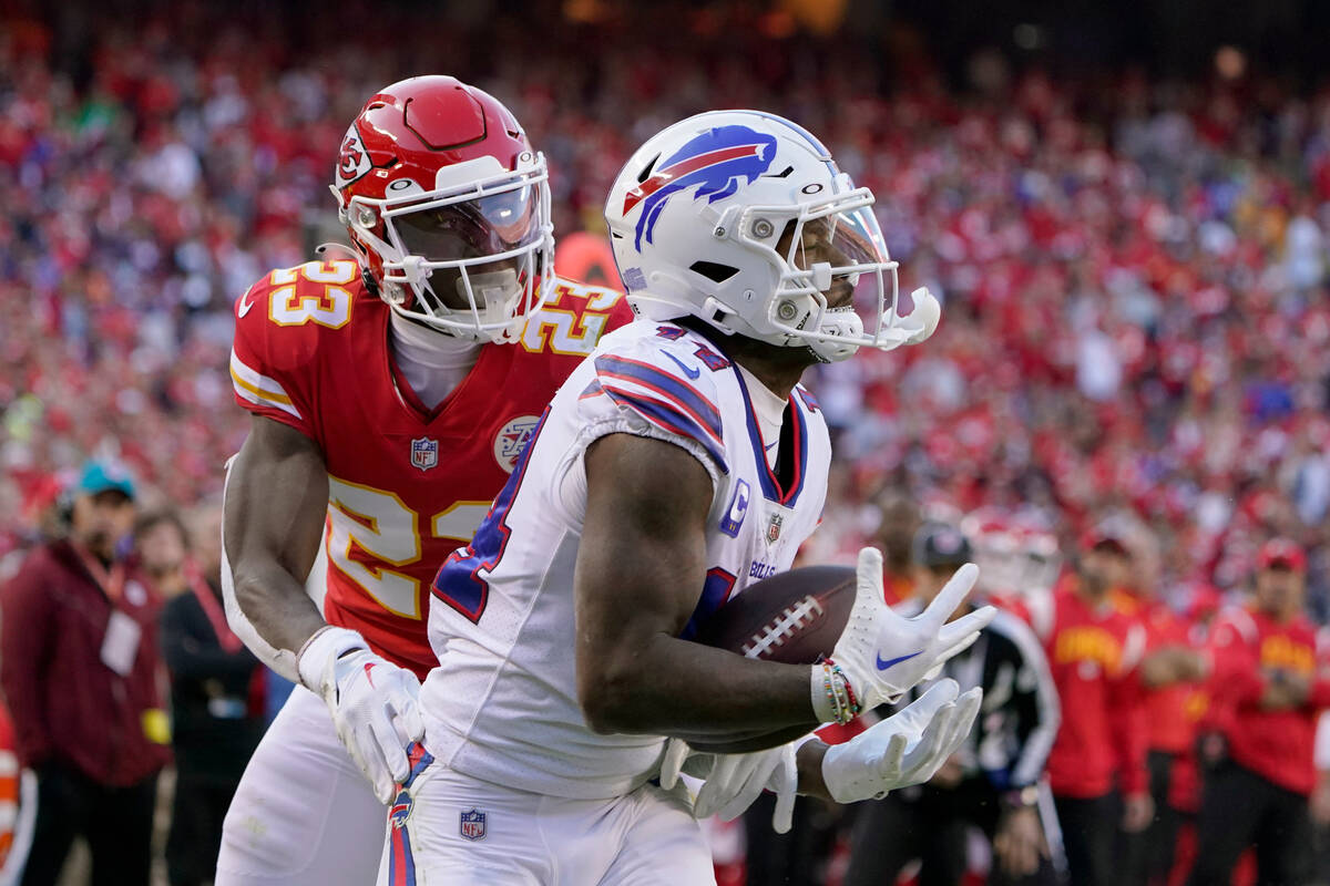 Buffalo Bills wide receiver Stefon Diggs, right, catches a touchdown pass as Kansas City Chiefs ...