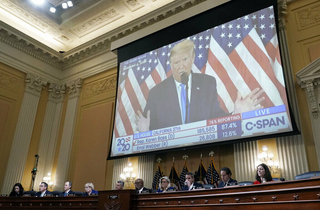FILE - A video of then-President Donald Trump speaking is displayed as the House select committ ...