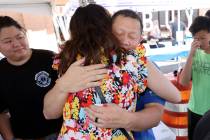 Thuong Thai, brother of fallen Las Vegas police officer Truong Thai, hugs Nevada Lt. Gov. Lisa ...