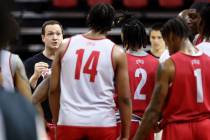 UNLV basketball coach Kevin Kruger interacts with his players during practice at Thomas & M ...