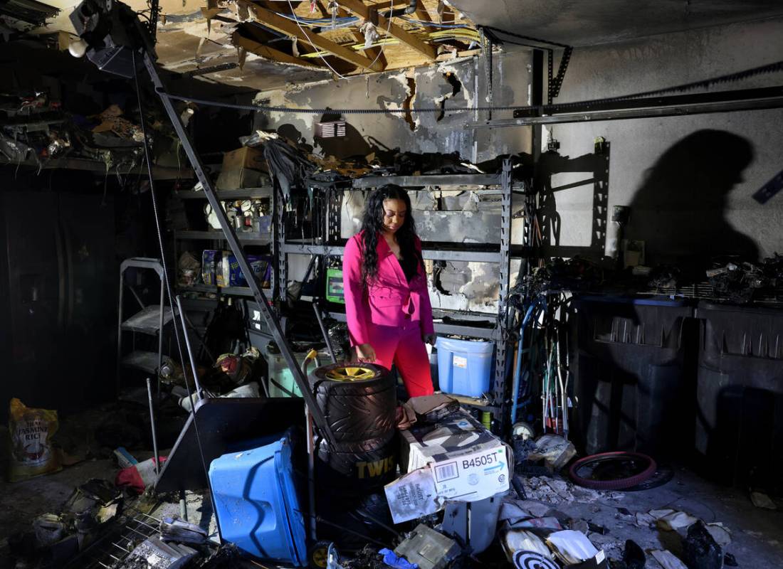 Cherise Coleman in the burned garage of her North Las Vegas home Friday, Oct. 21, 2022. Coleman ...