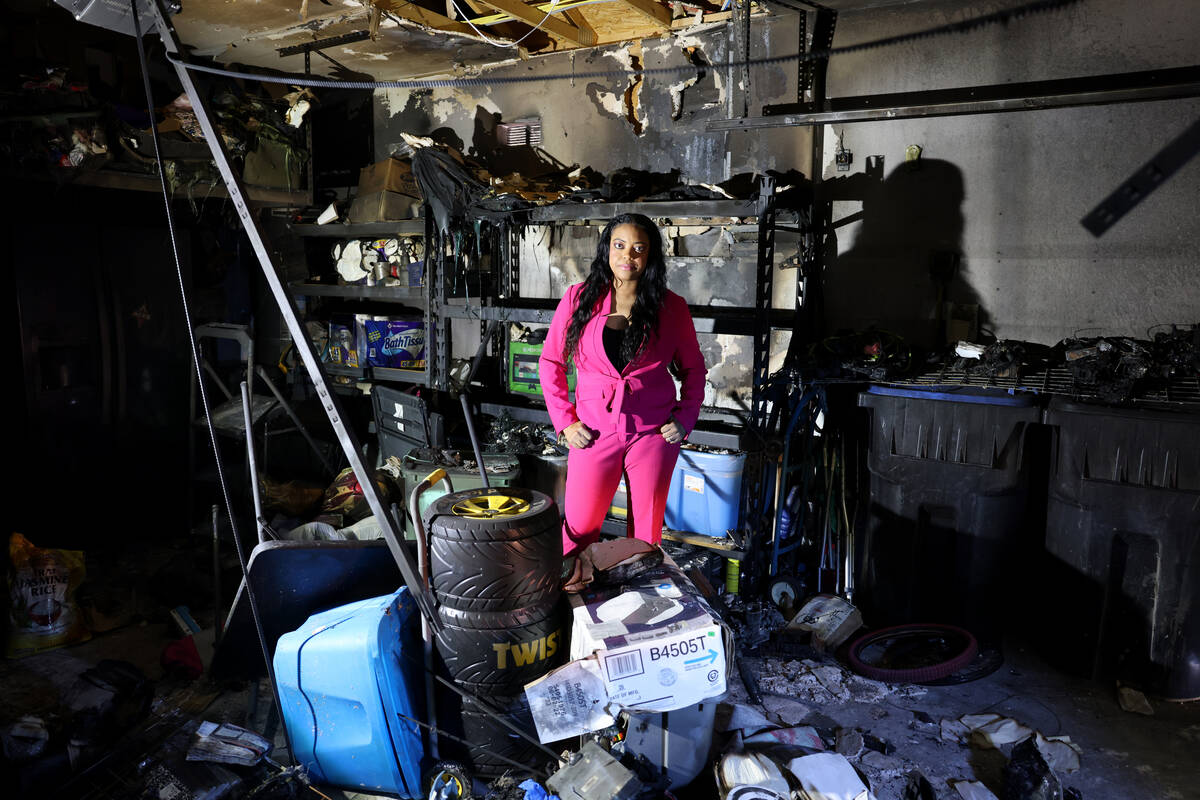 Cherise Coleman in the burned garage of her North Las Vegas home Friday, Oct. 21, 2022. Coleman ...