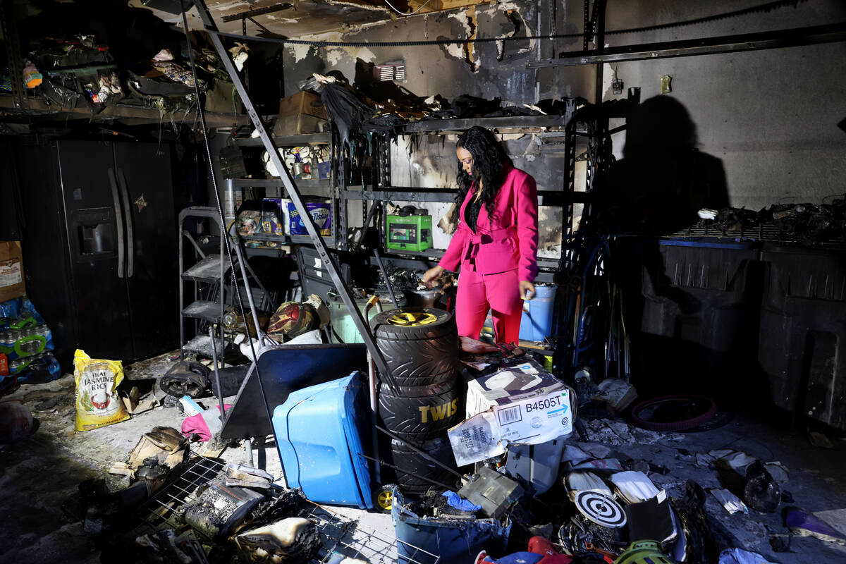 Cherise Coleman in the burned garage of her North Las Vegas home Friday, Oct. 21, 2022. Coleman ...