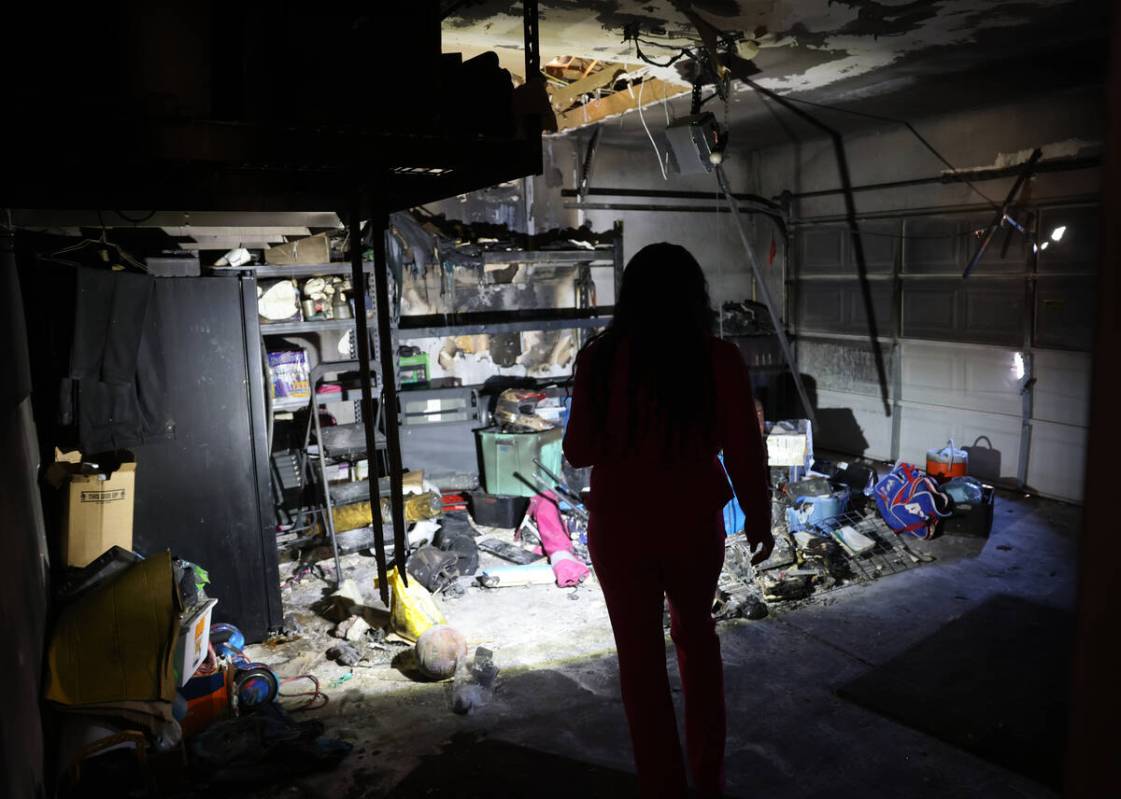 Cherise Coleman in the burned garage of her North Las Vegas home Friday, Oct. 21, 2022. Coleman ...