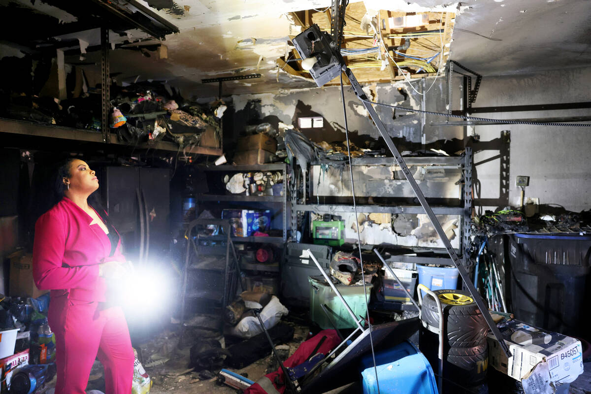 Cherise Coleman in the burned garage of her North Las Vegas home Friday, Oct. 21, 2022. Coleman ...