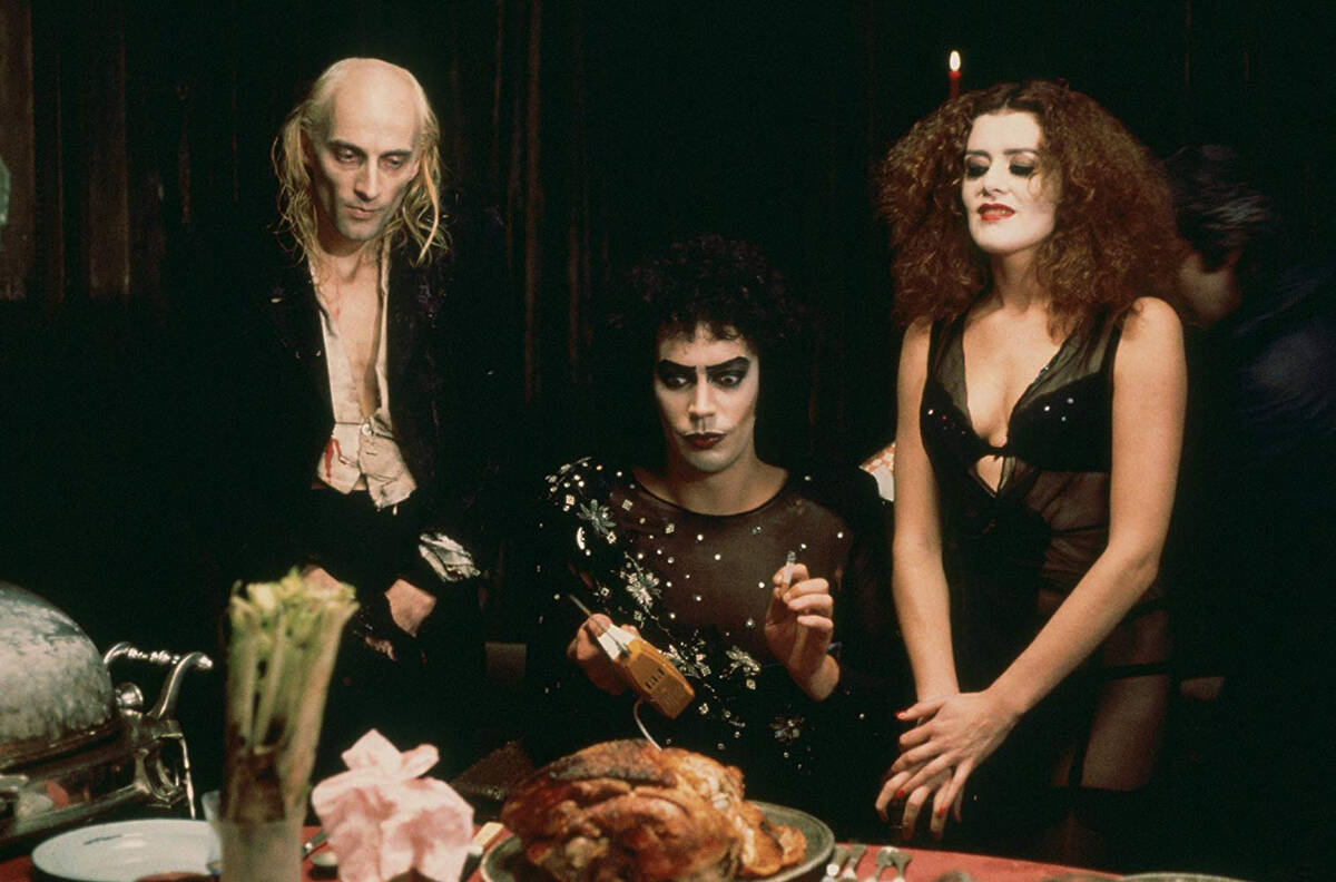 From left, Richard O'Brien, Tim Curry and Patricia Quinn appear in a scene from "The Rocky ...