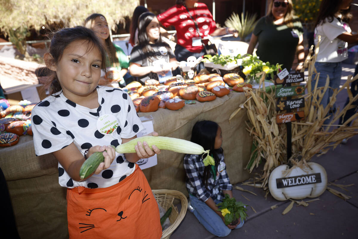 Bartlett Elementary School student Bobbie Kleinholz, 9, sells products on Thursday, Oct. 20, 20 ...