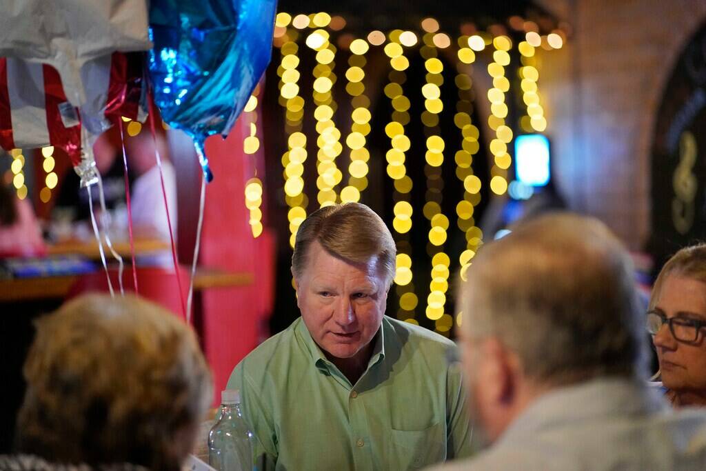 Jim Marchant, the GOP nominee for secretary of state, speaks with people at a political event o ...