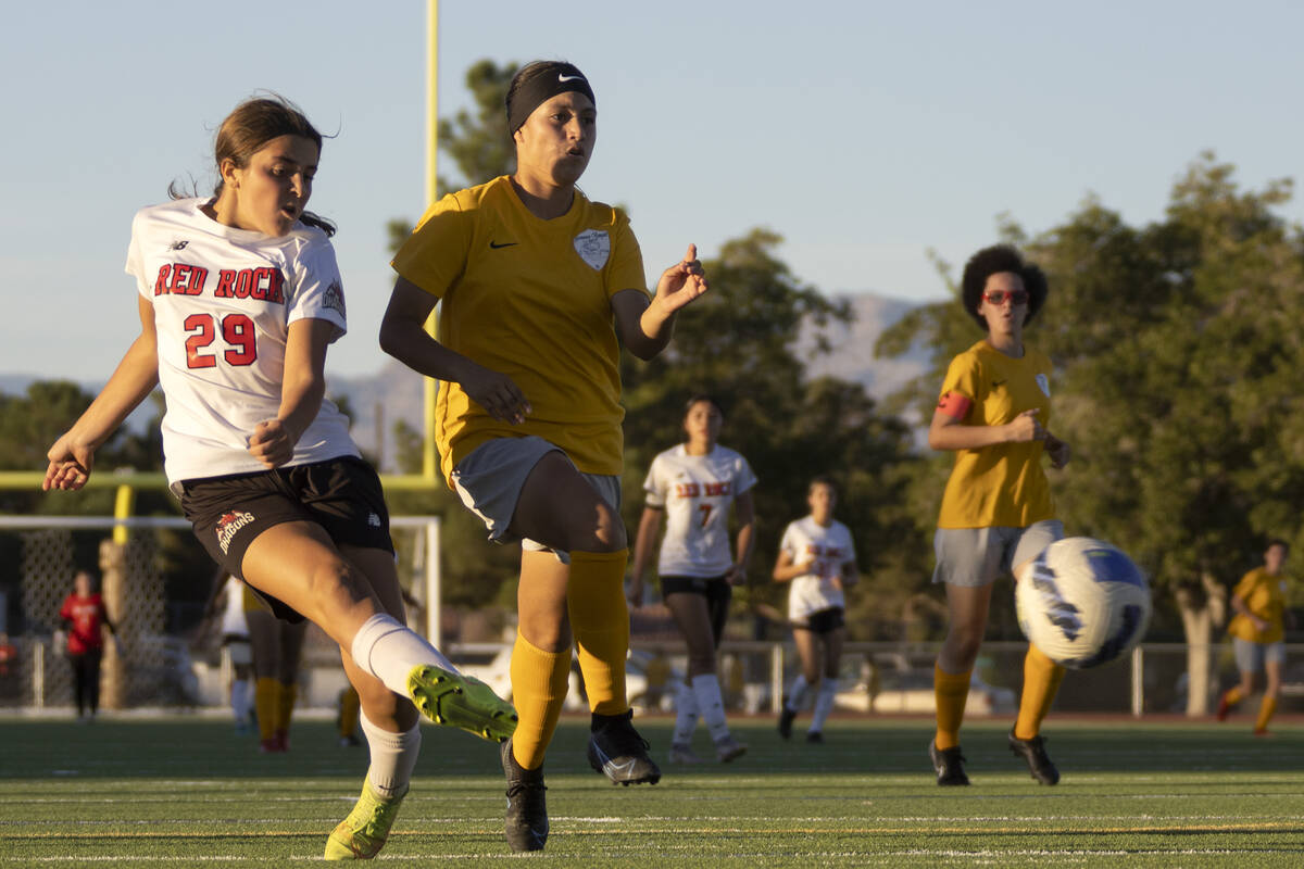 Doral Academy’s Sienna Turco (29) kicks to score a goal while Bonanza’s Ivonne Lo ...