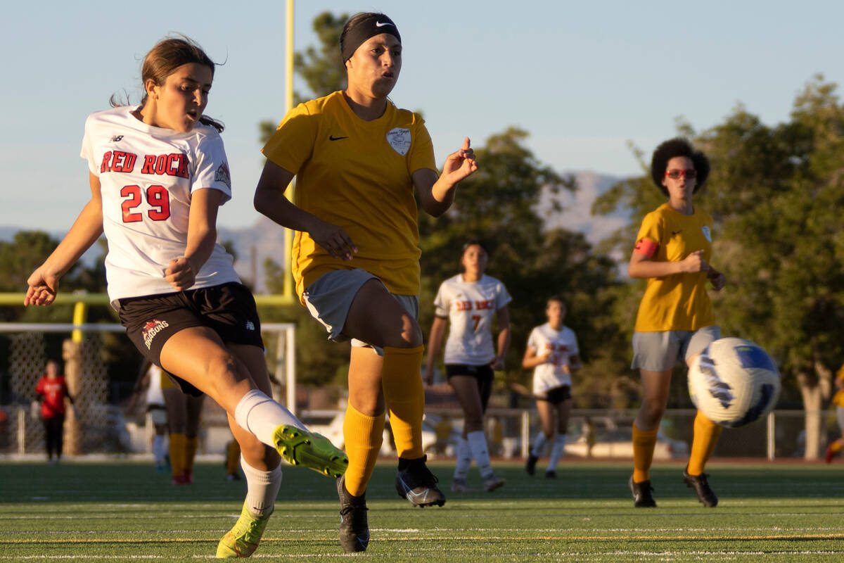 Doral Academy’s Sienna Turco (29) kicks to score a goal while Bonanza’s Ivonne Lo ...