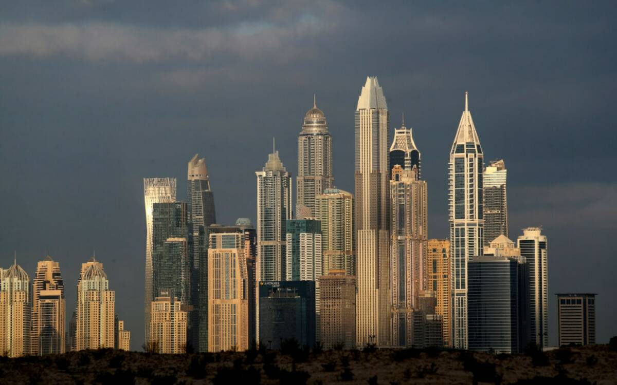The sun reflects on skyscrapers in Dubai, United Arab Emirates, Feb. 27, 2021. (AP Photo/Kamra ...