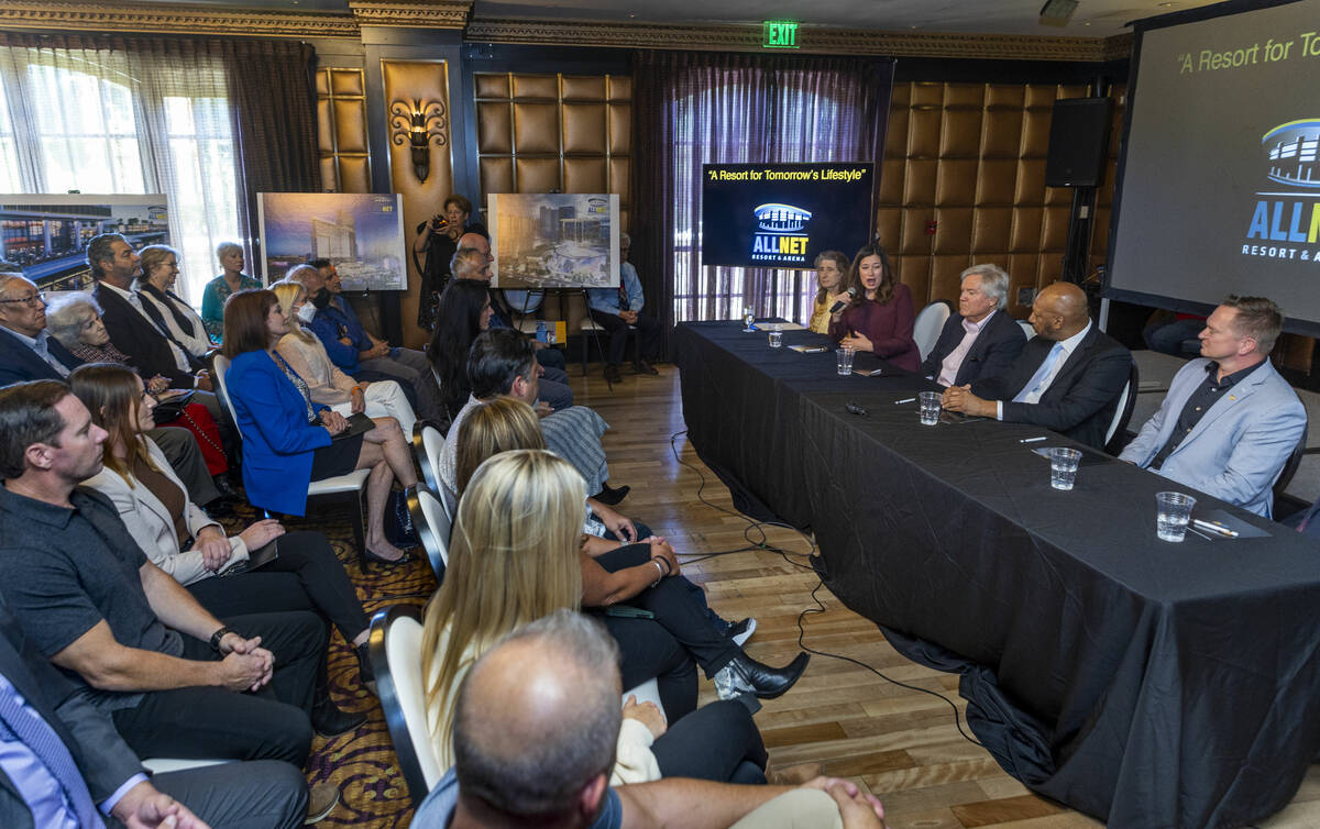 Ex-NBA player Jackie Robinson, center, holds a press conference to announce funding for his lon ...