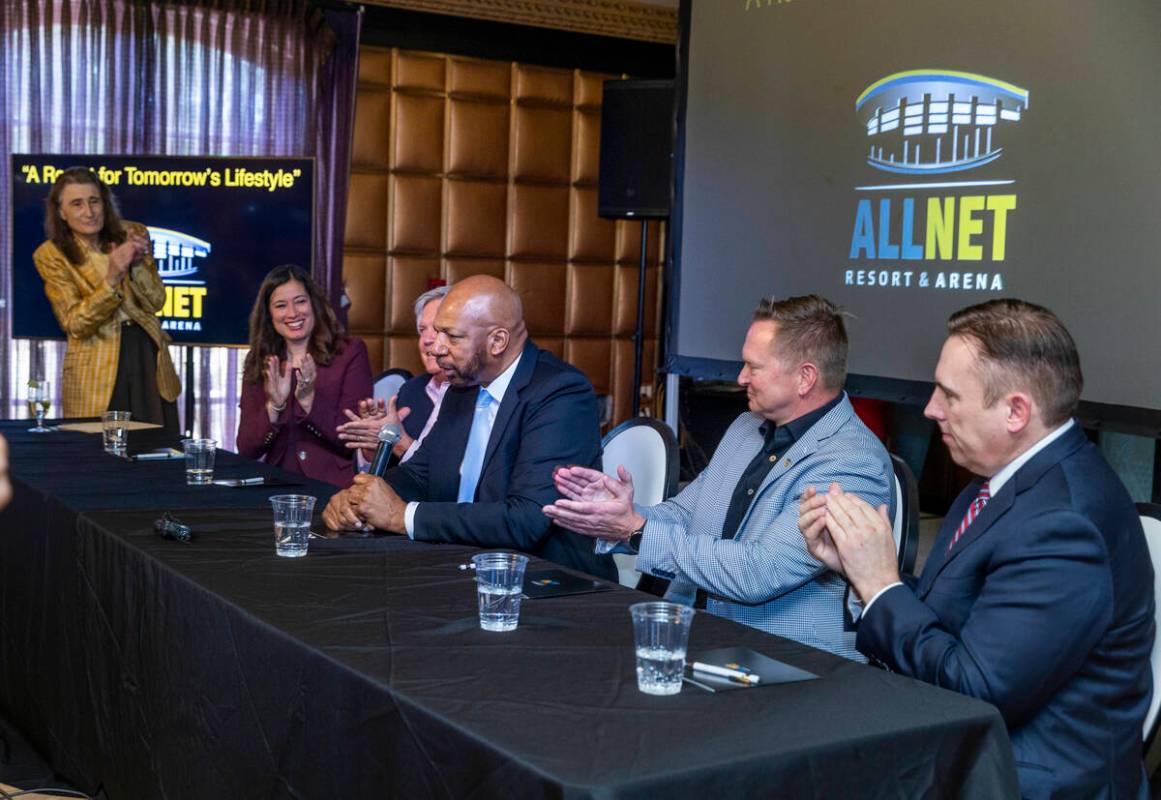 Ex-NBA player Jackie Robinson, center, holds a press conference to announce funding for his lon ...