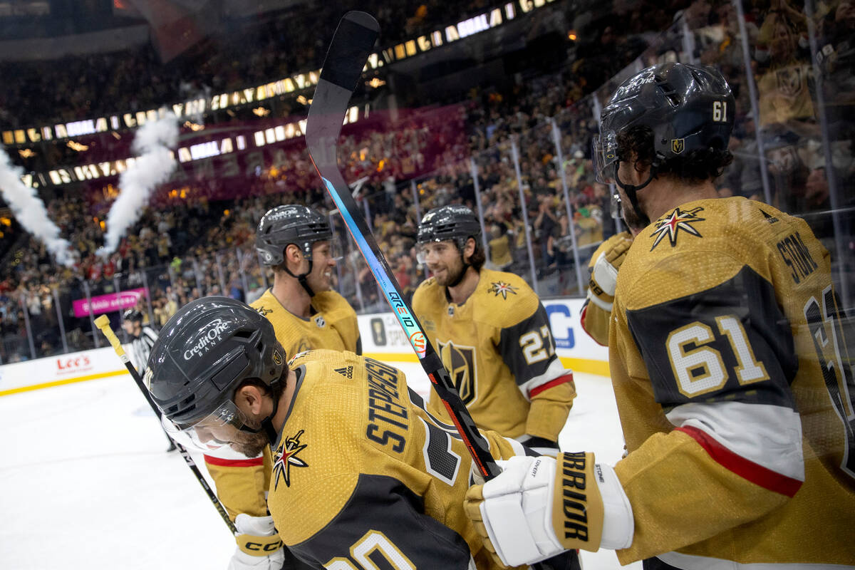 Golden Knights center Chandler Stephenson (20) skates for the bench after scoring a goal while ...